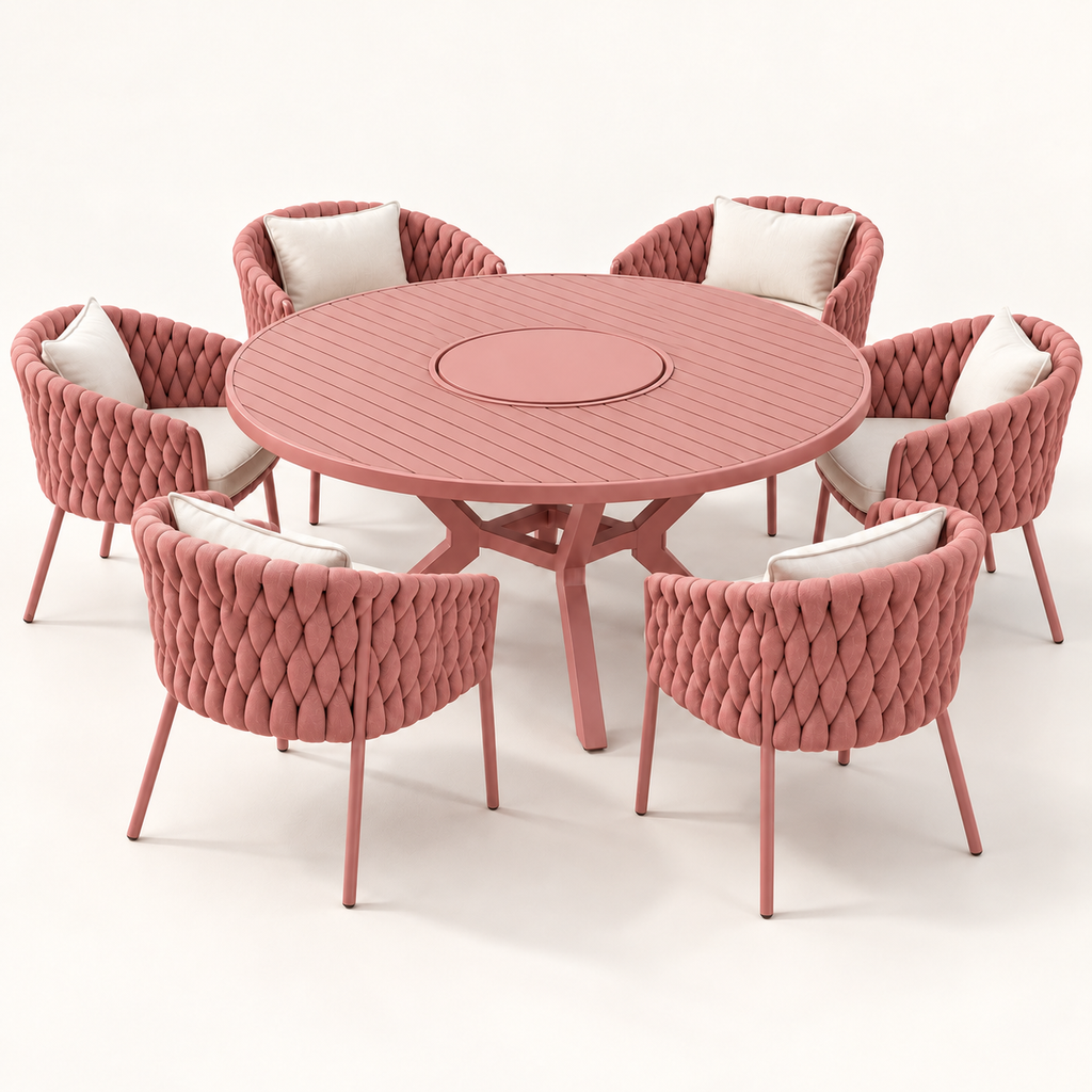 Representação digital do conjunto Solar Verano Rosa Mineral: mesa redonda com centro giratório e seis poltronas; tonalidade ilustrativa.